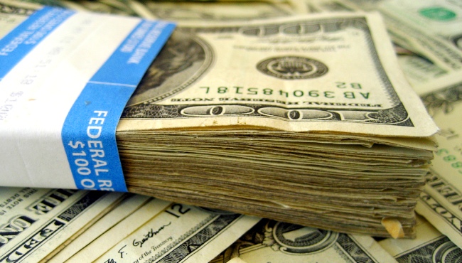 Americki dolar je blago smanjio dobitke u odnosu na korpu drugih glavnih valuta